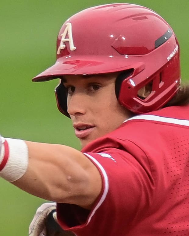Arkansas Razorbacks Peyton Holt celebrates a second-inning homer against Louisiana Tech